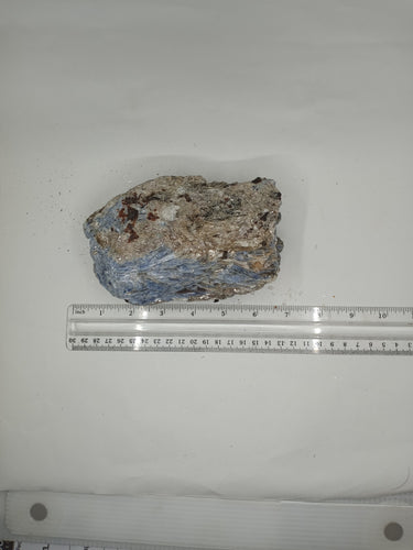 A brazilian kyanite stones with scale serene white surface.