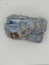 Load image into Gallery viewer, A kyanite stones in blue hues with streaks of gray and white, unique shapes.
